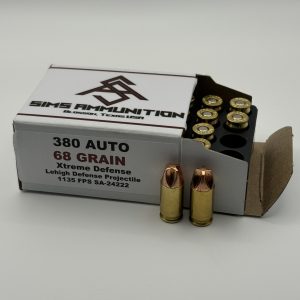 ms Ammunition – High-Quality Ammunition for Rifles and Shotguns" A partially open box labeled "380 Auto 68 Grain Xtreme Defense 20 Count Box" reveals its high-quality ammo contents, showcasing rifle cartridges, with two bullets standing upright in front. Although not depicted, the box is indicative of bulk ammunition offerings commonly sought by shooting enthusiasts alongside shotgun shells for comprehensive needs in today's ammunition market. Bulk Ammo Available for Purchase"